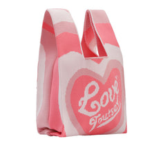 Load image into Gallery viewer, Pink Knit tote bag with bold love heart motif and soft structure
