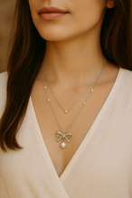 Load image into Gallery viewer, Silver Pearl Bow Pendant Necklace – Adjustable 15" to 17.5"