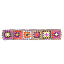 Load image into Gallery viewer, Flat lay of multicolor crochet floral headband with neck tie