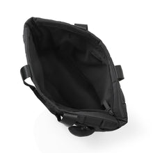 Load image into Gallery viewer, Interior of Nollia Emilia black quilted tote bag showing spacious zippered compartment"