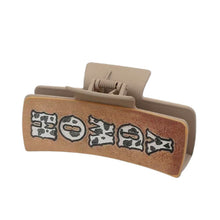 Load image into Gallery viewer, Nollia “Howdy” hair claw clip with western lettering on white background