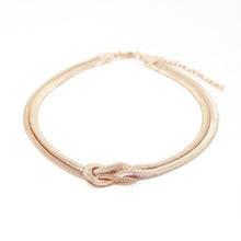 Load image into Gallery viewer, Nollia Gold Snake Chain Knot Necklace – Elegant 15&quot; Statement Choker
