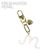 Load image into Gallery viewer, Nollia Pearl Initial Letter Charm – Elegant Monogram Bag Keychain
