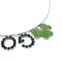 Load image into Gallery viewer, Close-up of shamrock and rhinestone detail on silver tiara headband
