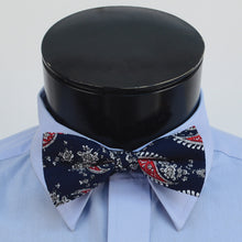 Load image into Gallery viewer, Navy floral paisley bow tie on model

