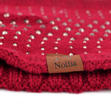 Load image into Gallery viewer, Nollia women&#39;s knit headband ear warmer in red zoomed in view on nollia tag
