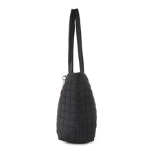 Load image into Gallery viewer, Side profile of black quilted tote bag with padded straps
