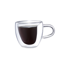 Load image into Gallery viewer, Transparent heart coffee cup filled with espresso
