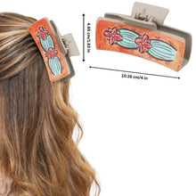 Load image into Gallery viewer, Woman wearing Nollia cactus flower hair clip in wavy hair
